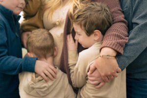 Christian working homemaker with children gathered in a quiet family moment