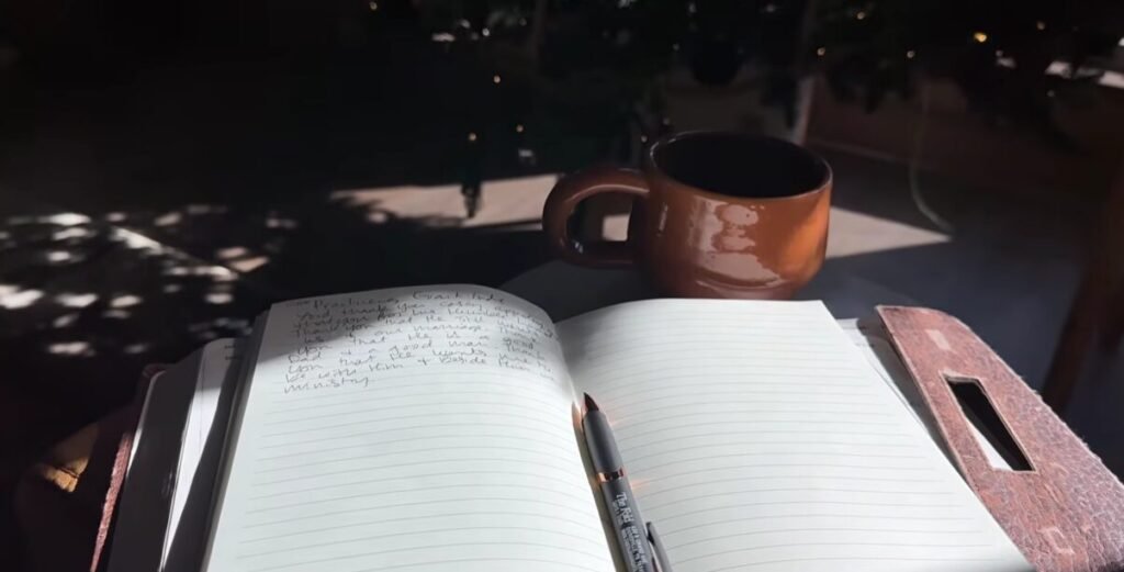 woman journaling with coffee during quiet time reflecting on why I still feel unfulfilled as a Christian